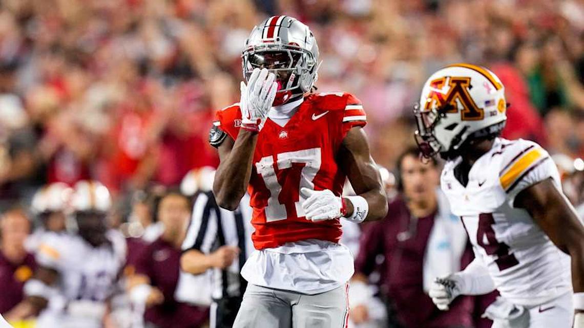  Ohio State Buckeyes wide receiver Carnell Tate (17) blows a kiss to the fans in the first half of the NCAA football game | Samantha Madar/Columbus Dispatch / USA TODAY NETWORK via Imagn Images 