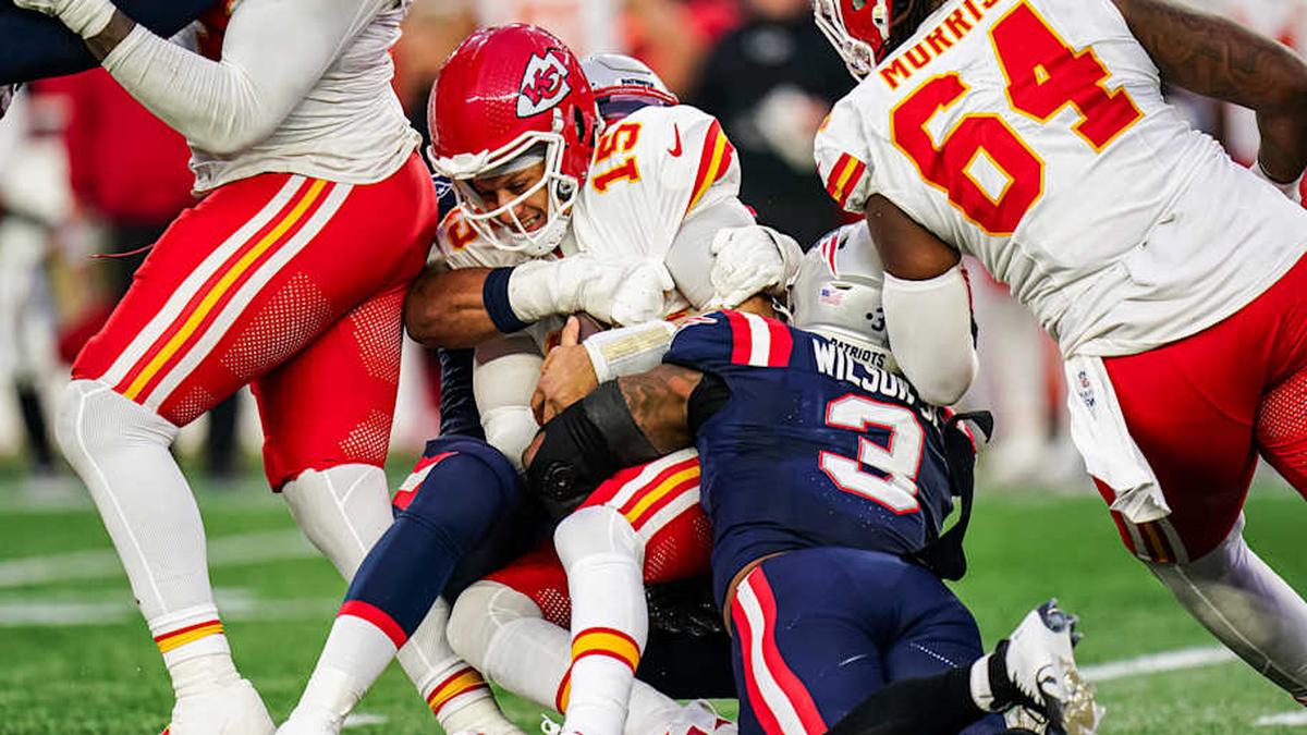  Dec 17, 2023; Foxborough, Massachusetts, USA; Kansas City Chiefs quarterback Patrick Mahomes (15) is sacked by New England Patriots linebacker Mack Wilson Sr. (3) in the second half at Gillette Stadium. Mandatory Credit: David Butler II-Imagn Images | David Butler II-Imagn Images 