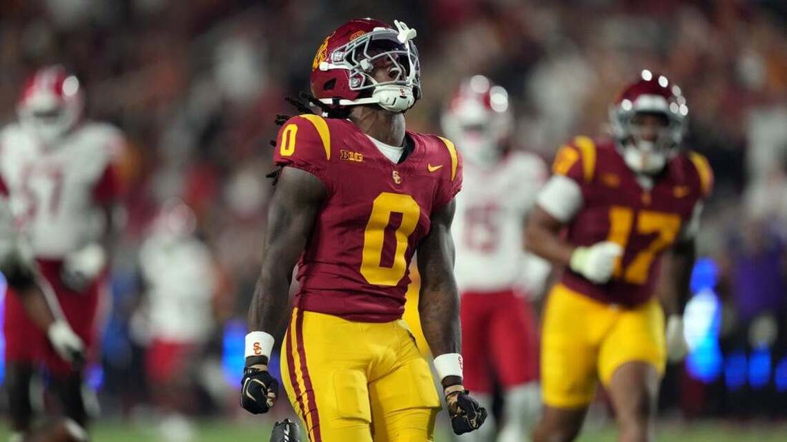 No. 12 USC's first road game a long trip to face struggling Rutgers 