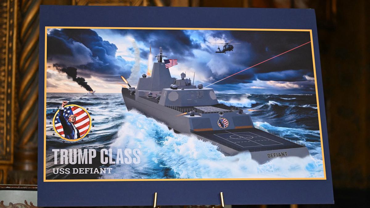 A concept rendering of the proposed Trump class USS Defiant is displayed as U.S. President Donald Trump announces the U.S. Navy's new Golden Fleet initiative, unveiling plans for a new class of warships at Mar-a-Lago in Palm Beach, Florida, on Dec. 22, 2025. (Andrew Caballero-Reynolds/AFP/Getty Images/TNS)