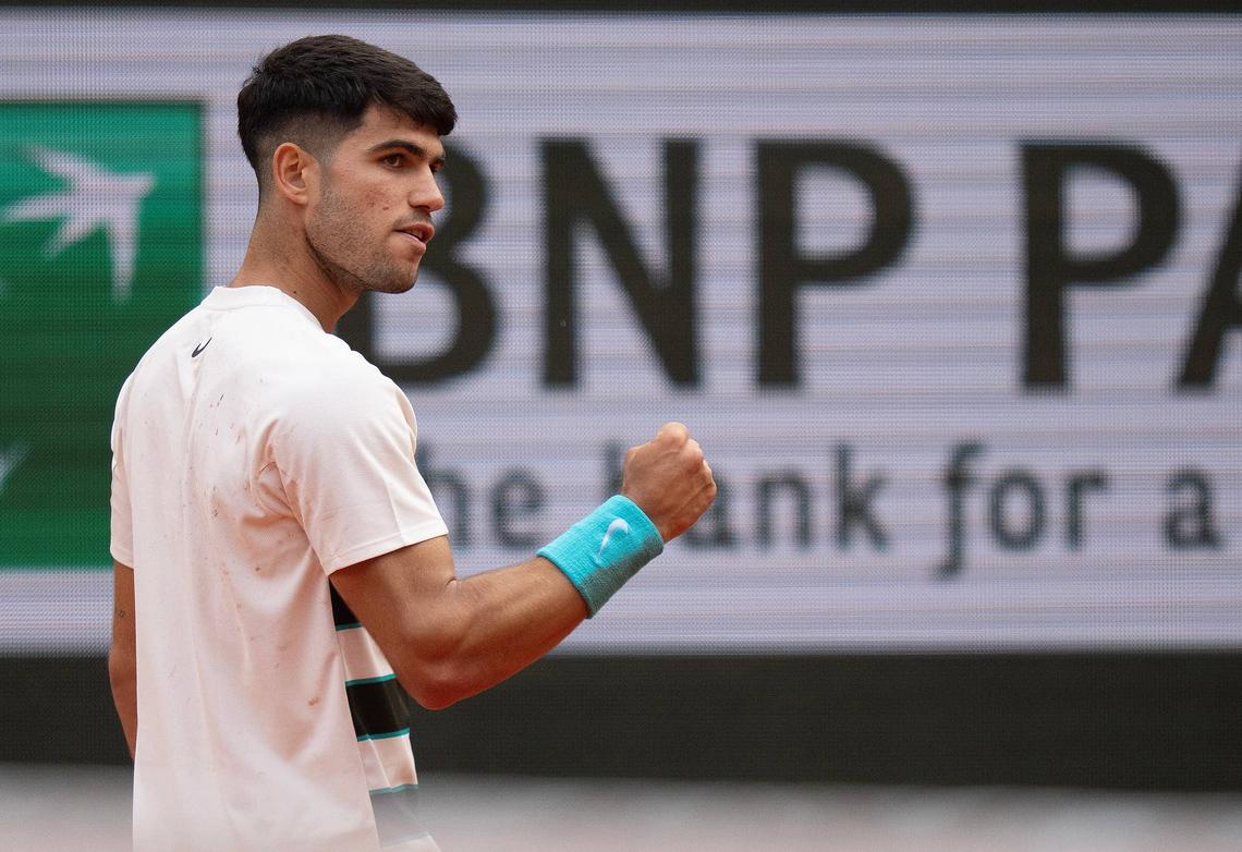  Jun 1, 2025; Paris, FR; Carlos Alcaraz of Spain reacts to a point during his match against Ben Shelton of the United States (not pictured) on day eight at Roland Garros Stadium. Mandatory Credit: Susan Mullane-Imagn Images 