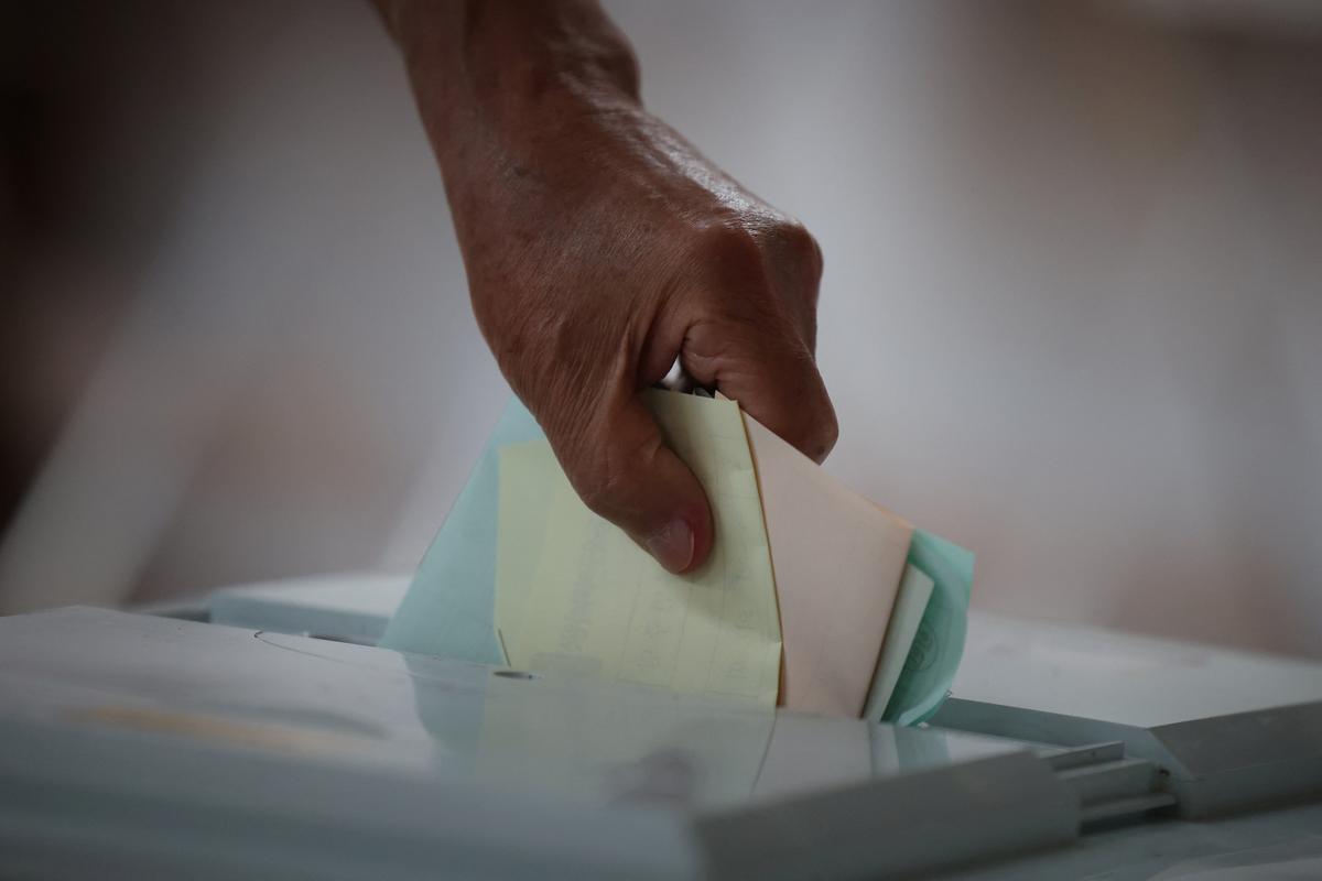 A woman casts her ballots during the local elections at a polling station in Seoul, South Korea, June 3, 2026. REUTERS/Kim Hong-Ji