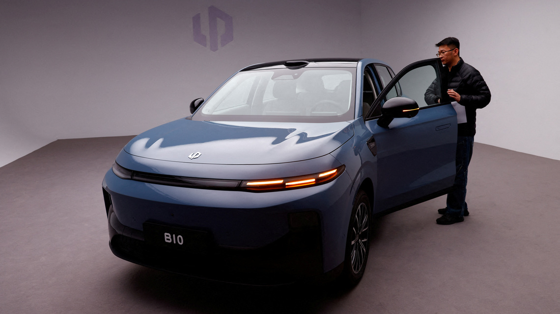 China flexes its auto-safety chops with huge recall of Tesla, other cars 