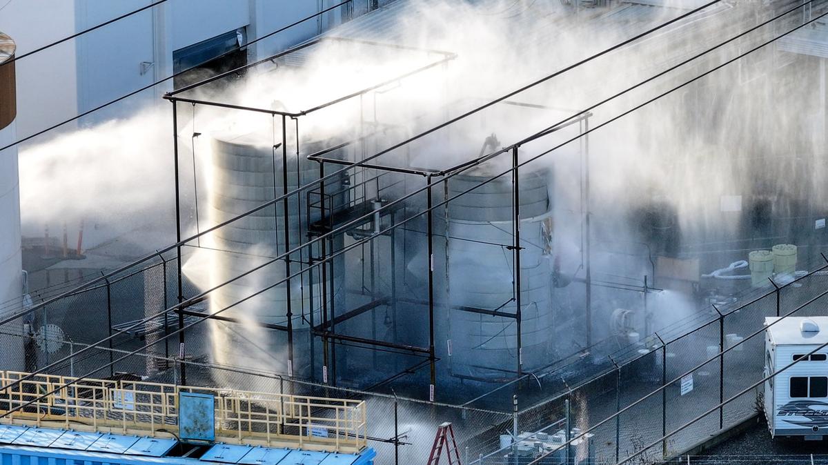 A pressurized tank filled with methyl methacrylate is sprayed with water at GKN Aerospace in Garden Grove, CA, on Saturday, May 23, 2026. (Photo by Jeff Gritchen, Orange County Register/SCNG)