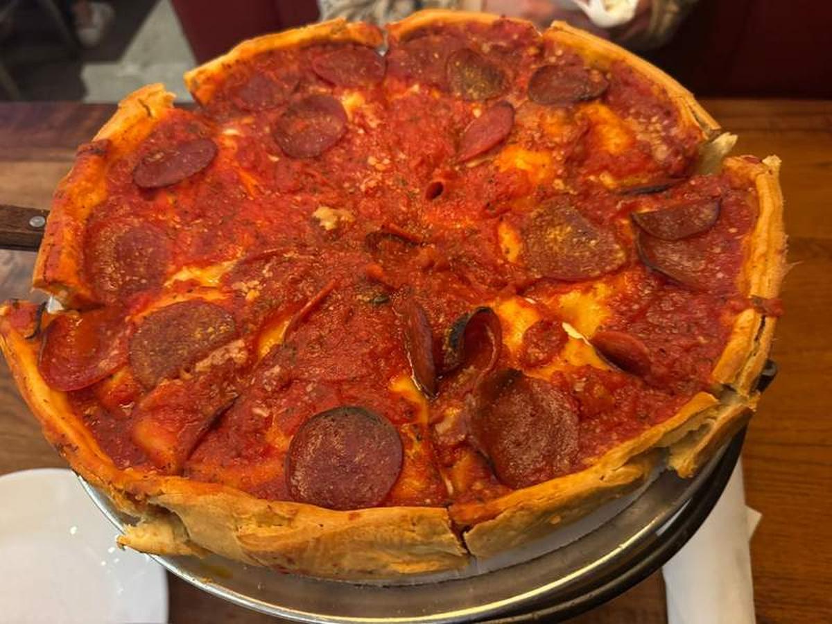  Enjoying a classic Chicago deep dish pizza at Giordano's. Photo credit: Emily Molina 