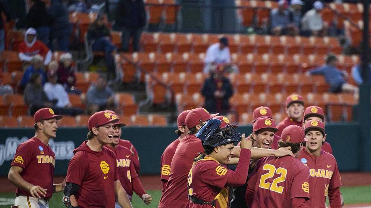  May 31, 2025; Corvallis, OR, USA; USC pitcher Caden Hunter (22) celebrates with teammates after a game against Saint Mary's at the NCAA Corvallis Regional at Goss Stadium. Mandatory Credit: Troy Wayrynen-Imagn Images | Troy Wayrynen-Imagn Images 