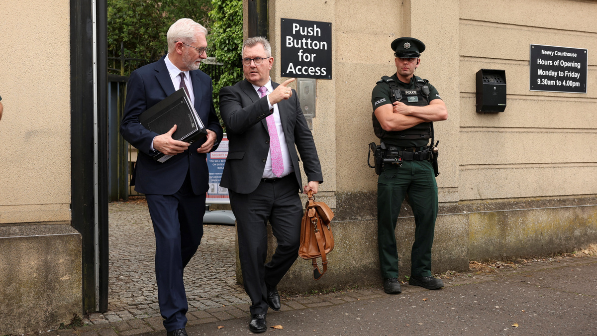Jeffrey Donaldson, former leader of the Democratic Unionist Party (DUP), charged with historical sex offences, leaves the Newry Courthouse as he appeared for trial, in Newry, Northern Ireland, June 17, 2026. REUTERS/Cathal McNaughton
