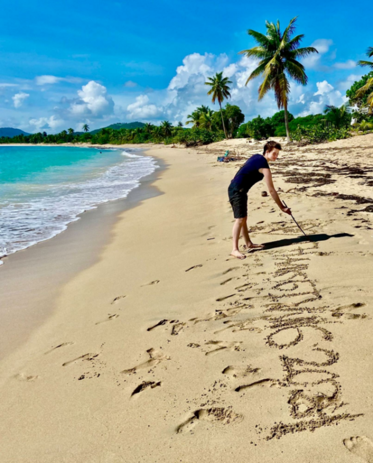  Some Vieques beaches are narrow or rocky or filled with plants, but Sun Bay has expansive sand, just right for posting messages. Photo credit: Christine Tibbetts 