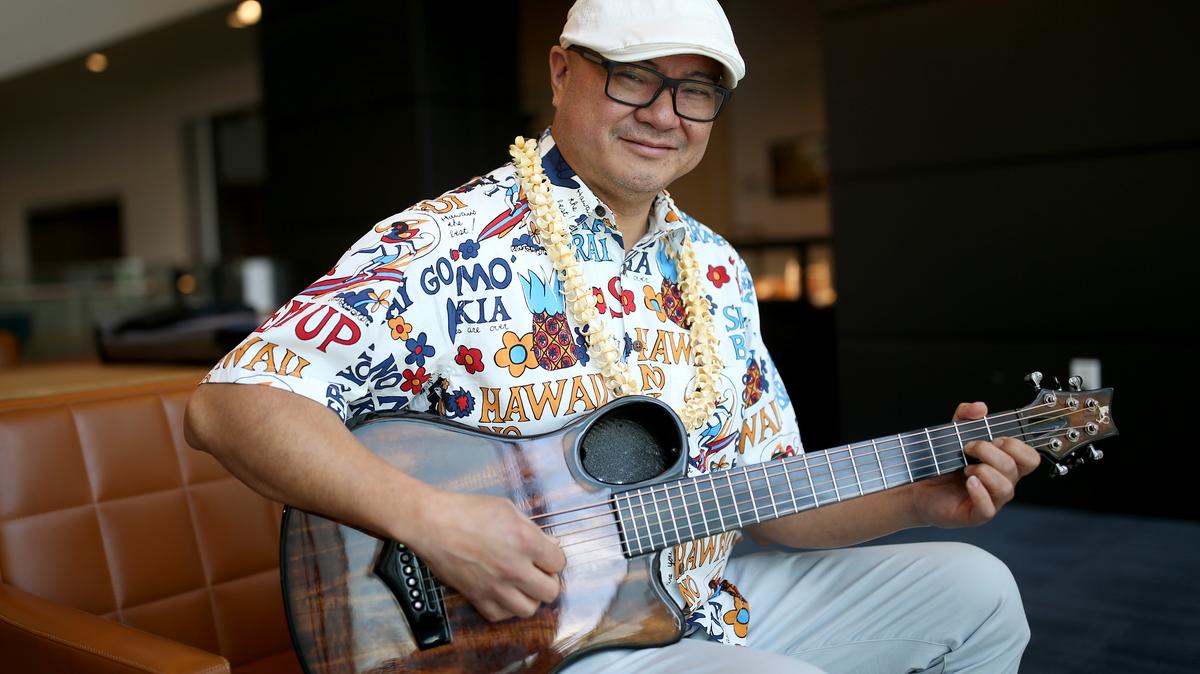 Patrick Landeza plays guitar at the Hayward Public Library in Hayward, Calif., on Thursday, May 11, 2023.  (Jane Tyska/Bay Area News Group)