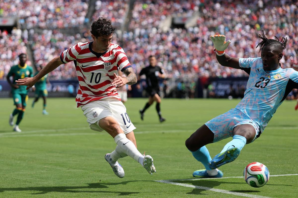  Christian Pulisic of the United States scores his team's second goal against Senegal during the international friendly match at Bank of America Stadium. Photo by Jamie Squire/Getty Images