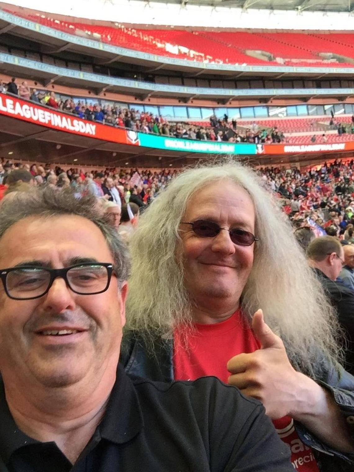  Martin Brunnschweiler and Steve McVeighty - known as Raz - at Wembley stadium in 2017. (Martin Brunnschweiler via SWNS) 