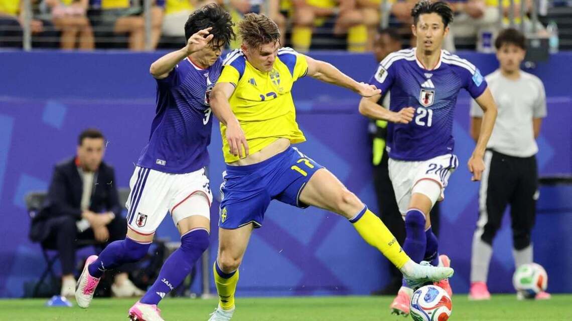 Japan, thanks to late saves, draw with Sweden, finish second in Group F 