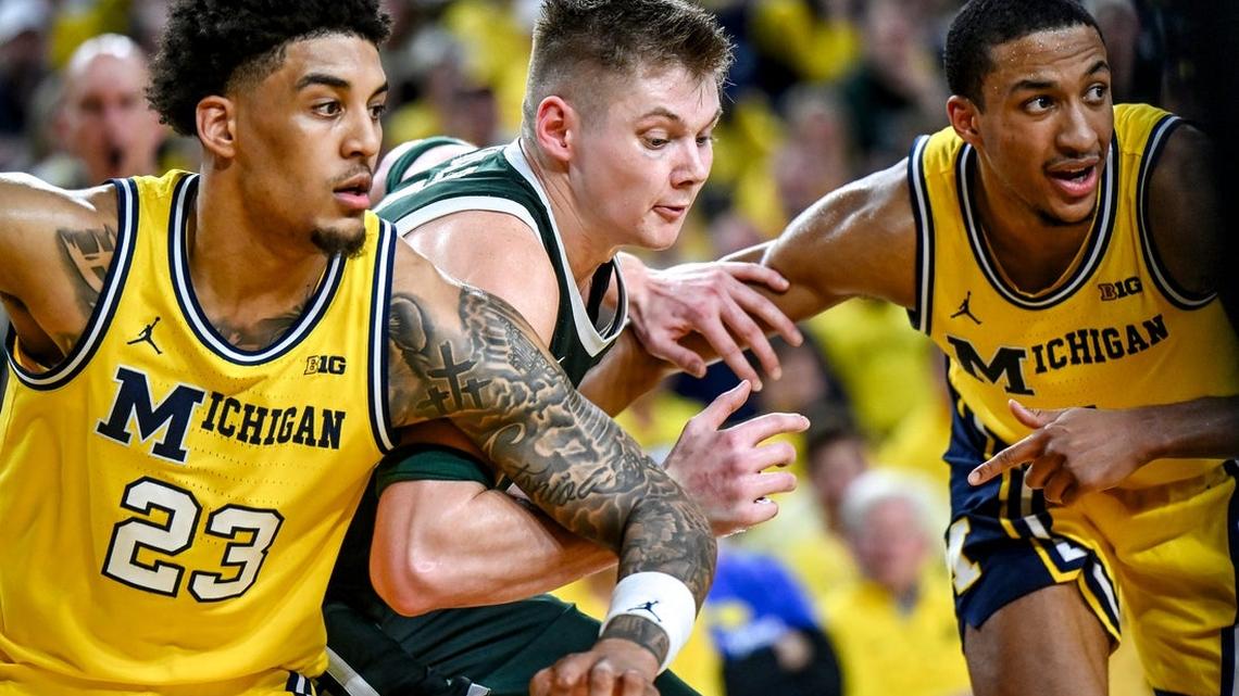 Top 25 roundup: No. 3 Michigan tops No. 8 Michigan St. for 19-1 Big Ten mark 