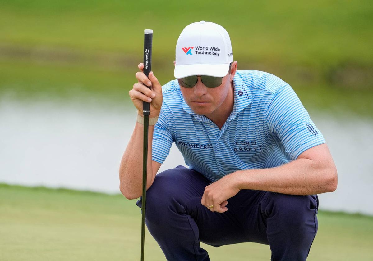  Ben Griffin lines up his putt on the first hole during the final round of the Cadillac Championship golf tournament. 