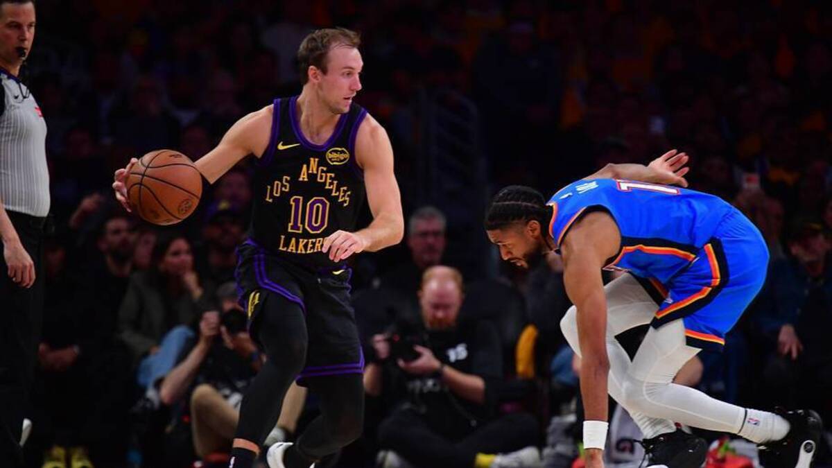  May 11, 2026; Los Angeles, California, USA; Los Angeles Lakers guard Luke Kennard (10) controls the ball against Oklahoma City Thunder guard Isaiah Joe (11) during the second half in game four of the second round of the 2026 NBA Playoffs at Crypto.com Arena. Mandatory Credit: Gary A. Vasquez-Imagn Images | Gary A. Vasquez-Imagn Images 
