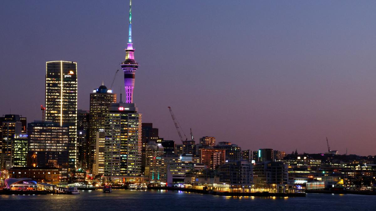 FILE PHOTO: General view of the Auckland skyline at sunset. Auckland, New Zealand - August 3, 2023 REUTERS/Molly Darlington/File Photo