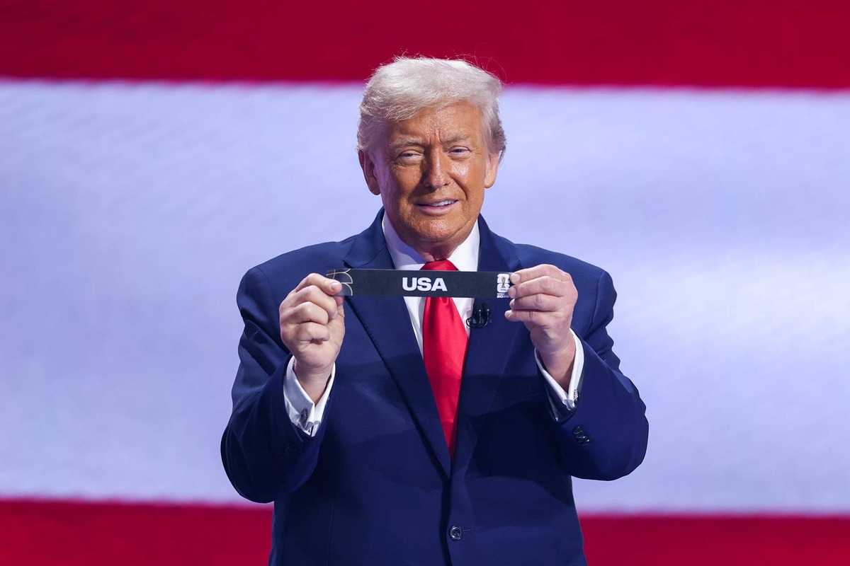  U.S. President Donald Trump draws out the card of United States during the FIFA World Cup 2026 Official Draw at John F. Kennedy Center for the Performing Arts on December 05, 2025 in Washington, DC. PPhoto by Michael Regan - FIFA/FIFA via Getty Images