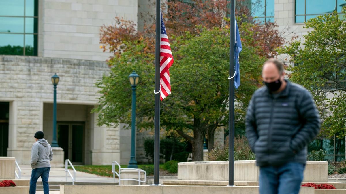 Gov. Laura Kelly announced Wednesday, Oct. 28, 2020, that flags would be flown at half-mast to honor lives of more than 1,000 Kansans who have died due to COVID-19, in Topeka, Kan. (Evert Nelson/The Topeka Capital-Journal via AP)