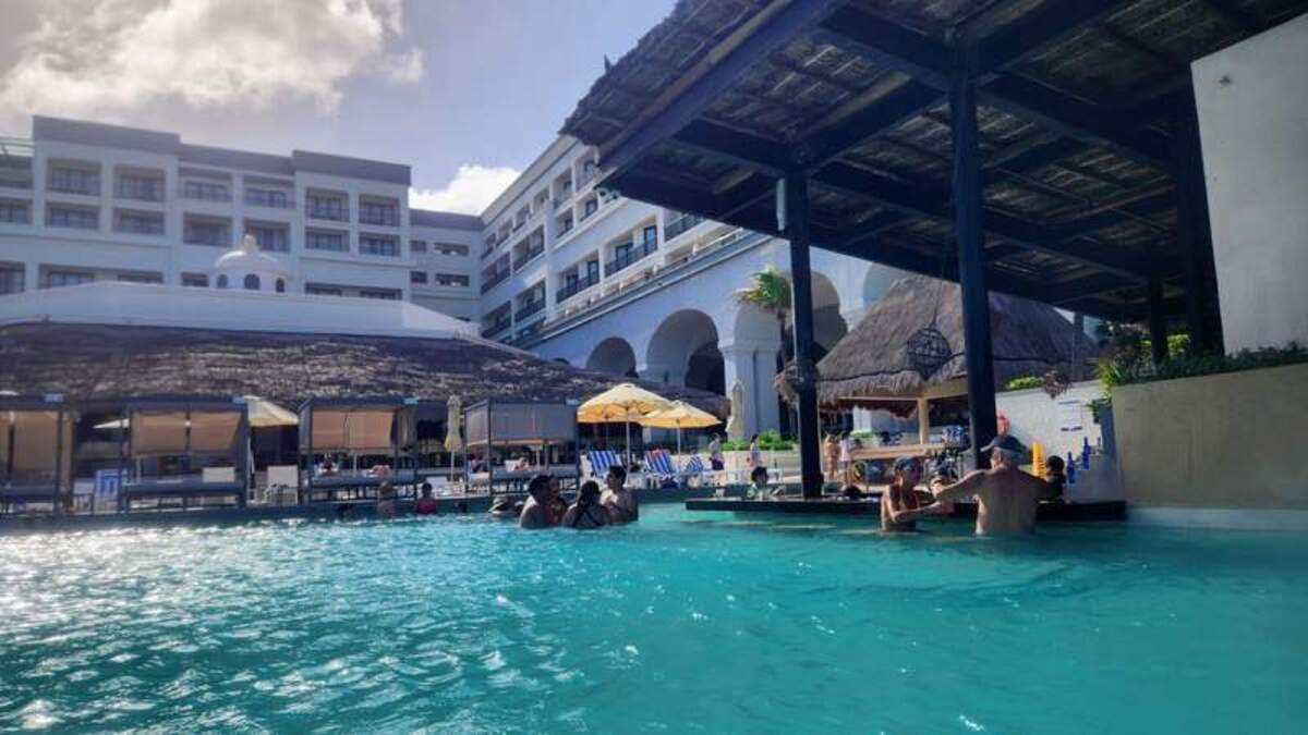  The adults-only pool gives the 18+ crowd a place to get some pool time and enjoy drinks in a quieter, more relaxed area. Photo credit: Kimberly Miles 