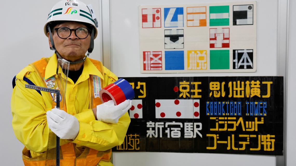 Japanese security guard finds fame as designer of duct tape signs​ 