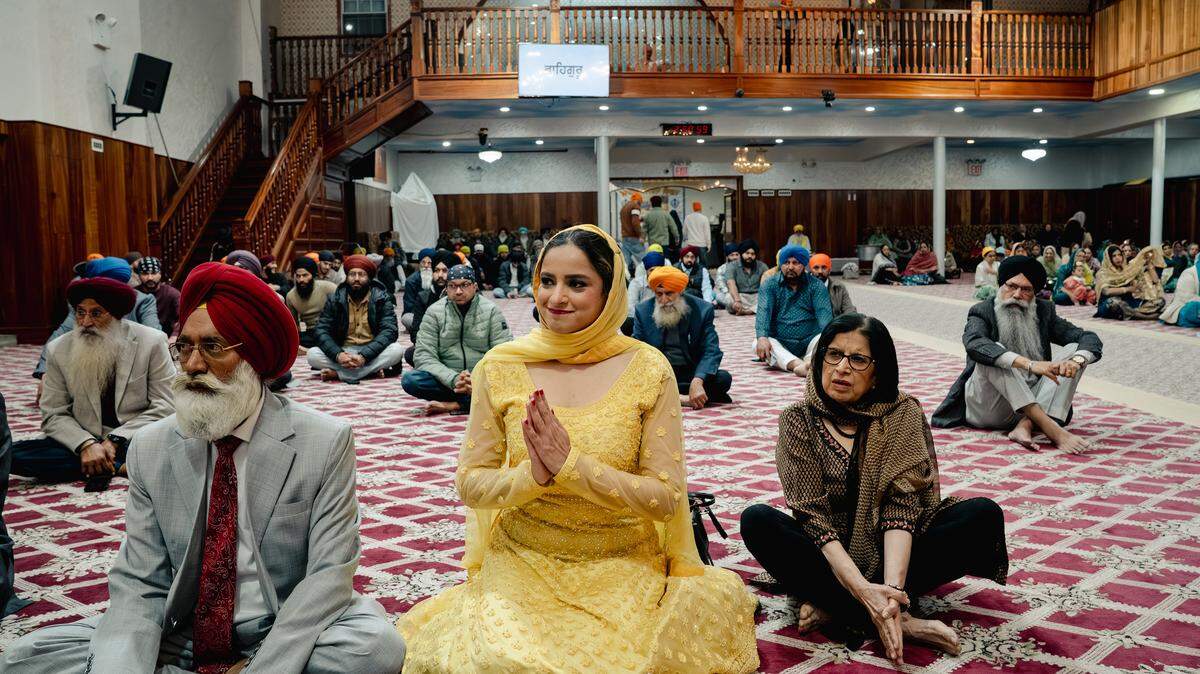 Jenifer Rajkumar, center, who was the first South Asian American woman to be elected to the New York State Legislature, at Baba Makhan Shah Lubana Sikh Center in New York, on April 19, 2026. The same progressive South Asian networks that helped elect Zohran Mamdani as mayor in New York are mobilizing against Rajkumar, a Queens assemblywoman.