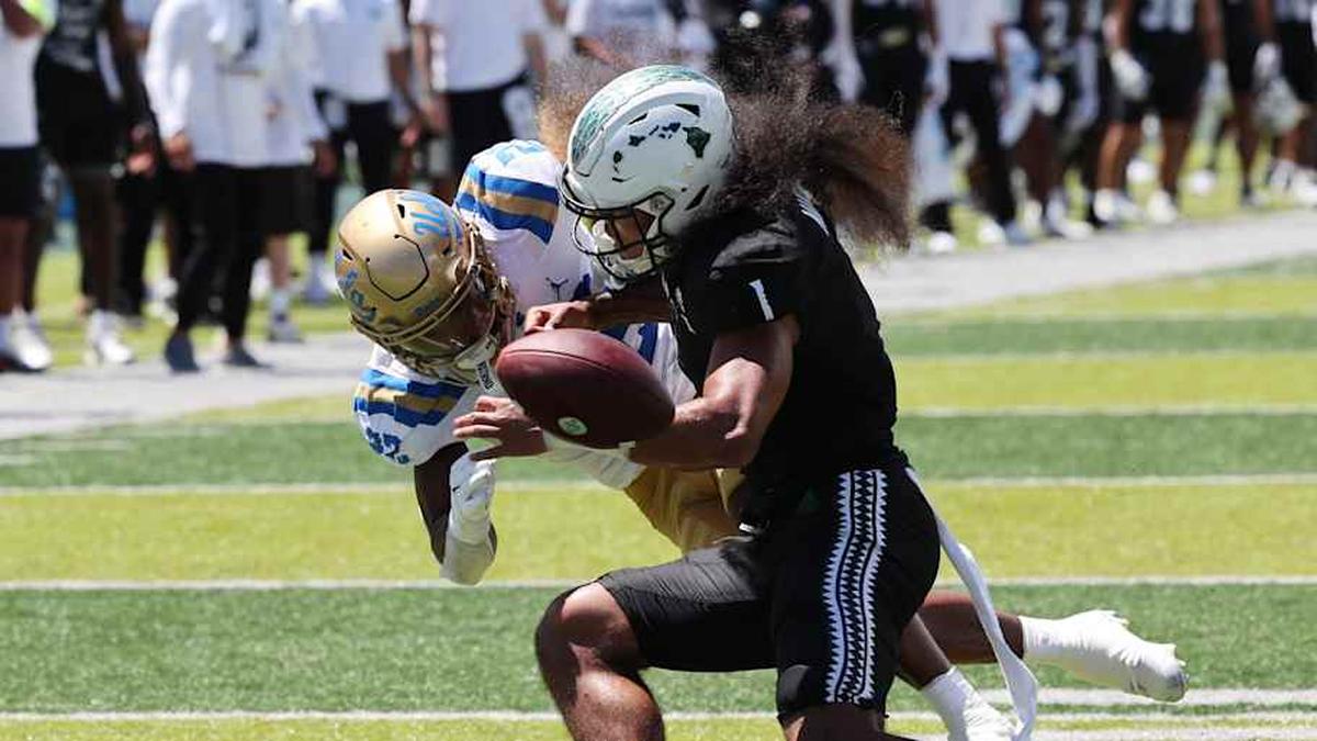  Aug 31, 2024; Honolulu, Hawaii, USA; Hawaii Rainbow Warriors defensive back Peter Manuma (1) breaks up a pass intended for Hawaii Rainbow Warriors wide receiver Chad Owens Jr. (22) during the first quarter of an NCAA college football game at the Clarence T.C. Ching Athletics Complex. Mandatory Credit: Marco Garcia-Imagn Images | Marco Garcia-Imagn Images 