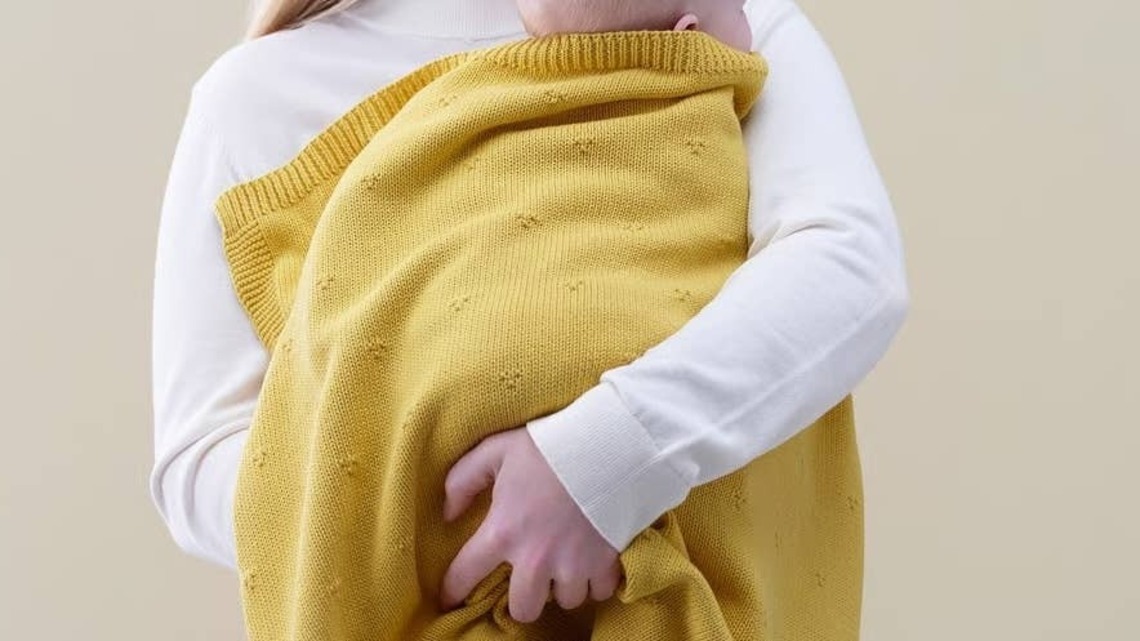 This New Organic Cotton Knitted Baby Blanket From IKEA Is So Soft and Cozy-and Costs Under $20 