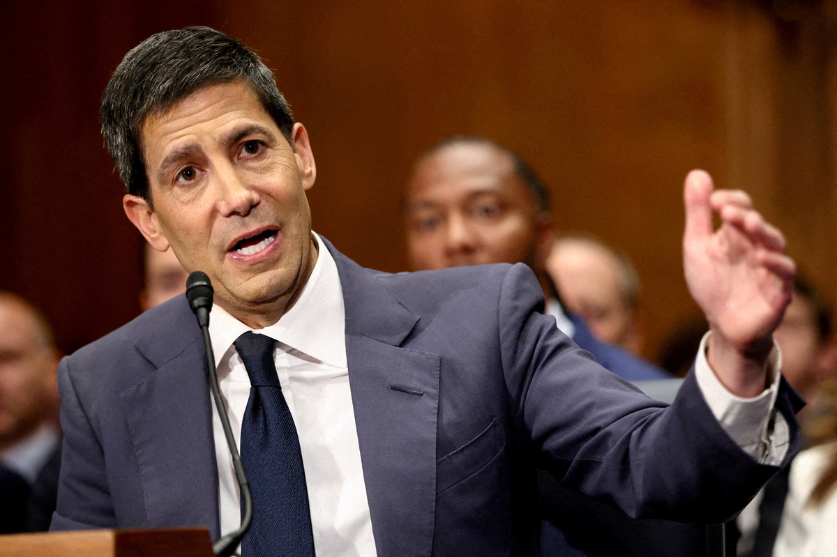 FILE PHOTO: Kevin Warsh, soon to be sworn in as chair of the Federal Reserve, testifies before a Senate Banking Committee confirmation hearing on Capitol Hill in Washington, D.C., U.S., April 21, 2026. REUTERS/Kevin Lamarque/File Photo