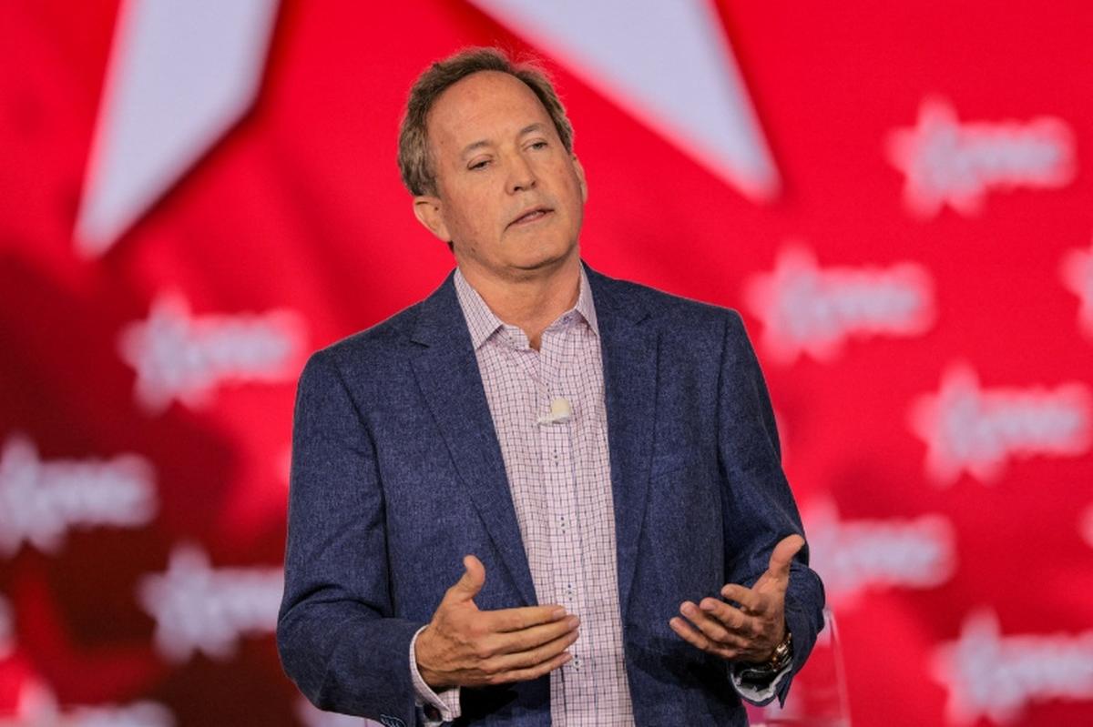 FILE PHOTO: Texas Attorney General Ken Paxton speaks during the Conservative Political Action Conference (CPAC) USA 2026 at the Gaylord Texan Resort and Convention Center, in Grapevine, Texas, U.S., March 28, 2026.  REUTERS/Daniel Cole/File Photo