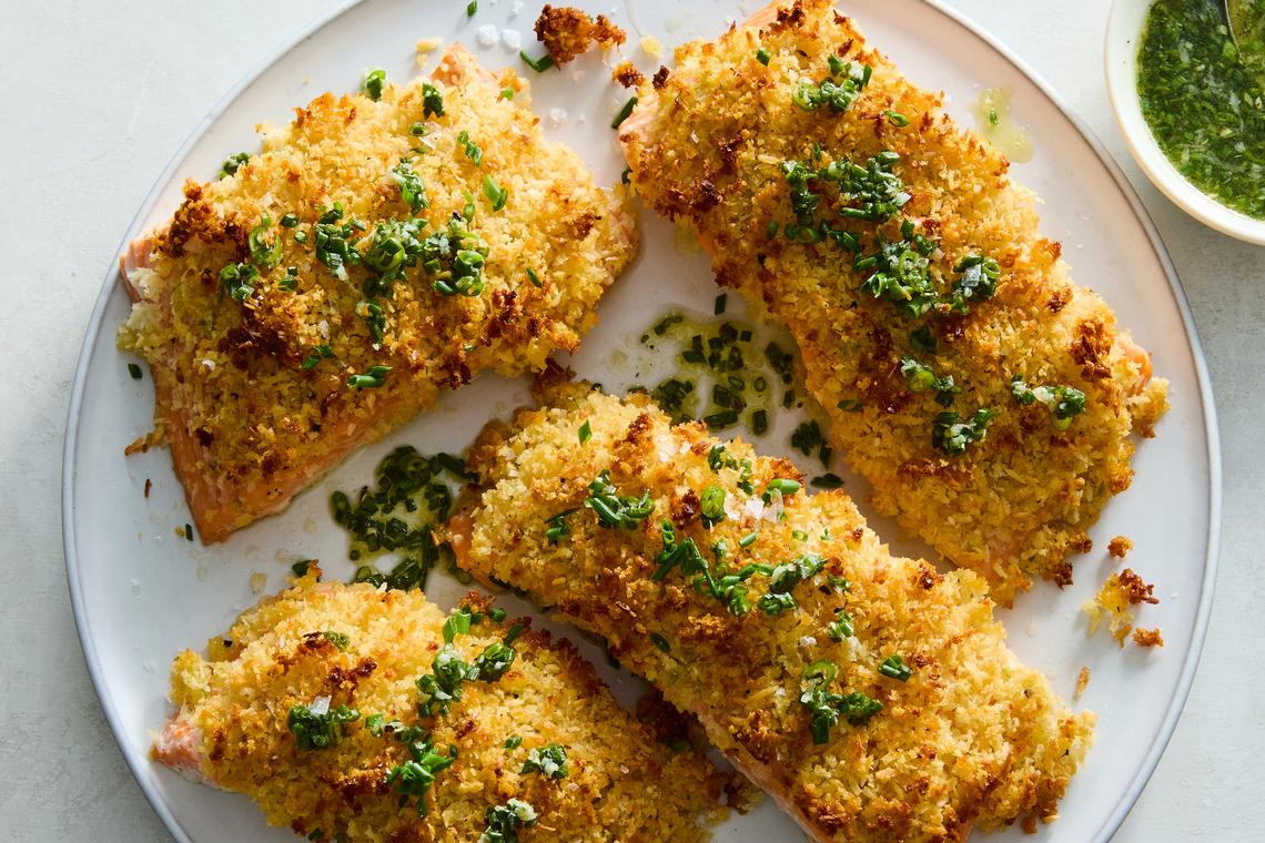 Crispy coconut salmon. The tenderness of salmon is especially on display when the fish is coated with something crispy before searing or roasting. Food styled by Simon Andrews. (Ryan Liebe/The New York Times)
