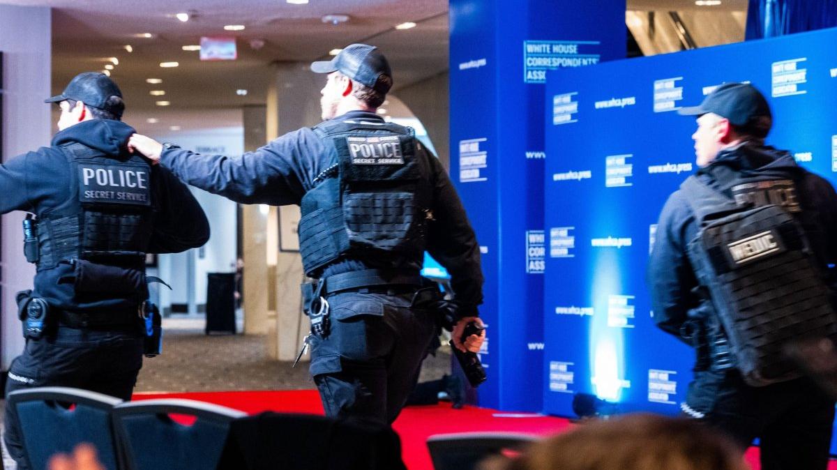 Secret Service officers rush to the sound of gunfire April 25 in the Washington Hilton after shots were heard during the White House Correspondents' Dinner in Washington, D.C. The dinner has been rescheduled for July 24. Photo by Aaron Schwartz/UPI