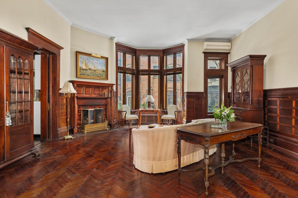  A living room area with a parquet floor is seen at 842 Carroll Street. 