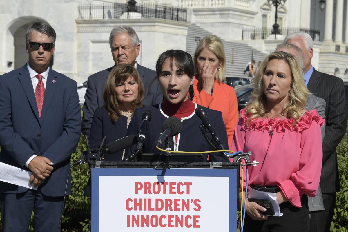  Chloe Cole, accompanied by then-Representative Marjorie Taylor Greene, speaks on Capitol Hill on September 20, 2022. 