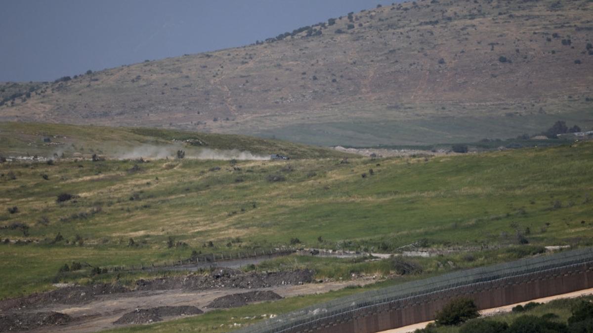An Israeli military vehicle operates in Lebanon by the Israeli‑Lebanese border, as seen from northern Israel, May 14, 2026. REUTERS/Shir Torem