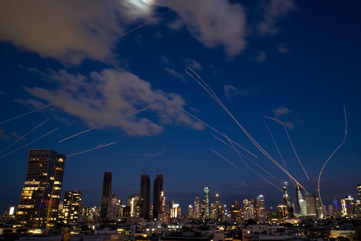  Time exposure of Israeli forces shooting down Iranian missiles. Chen Junqing / Xinhua / Getty Images)