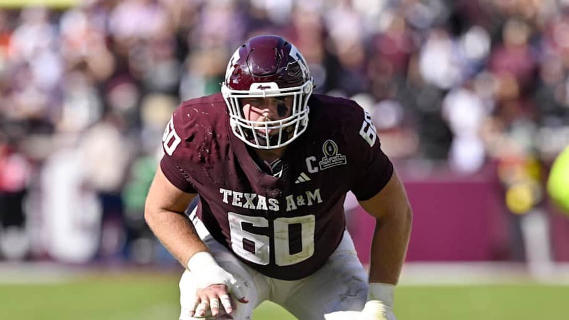  Dec 20, 2025; College Station, TX, USA; Texas A&M Aggies offensive lineman Trey Zuhn III (60) lines up during the game between the Aggies and the Hurricanes at Kyle Field. Mandatory Credit: Jerome Miron-Imagn Images | Jerome Miron-Imagn Images 
