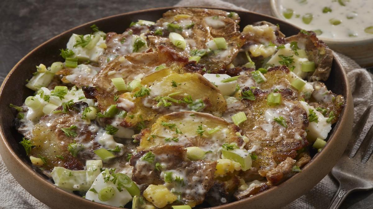 The Viral Crispy Smashed Potato Salad with Mayo, hard Boiled Eggs and Scallions