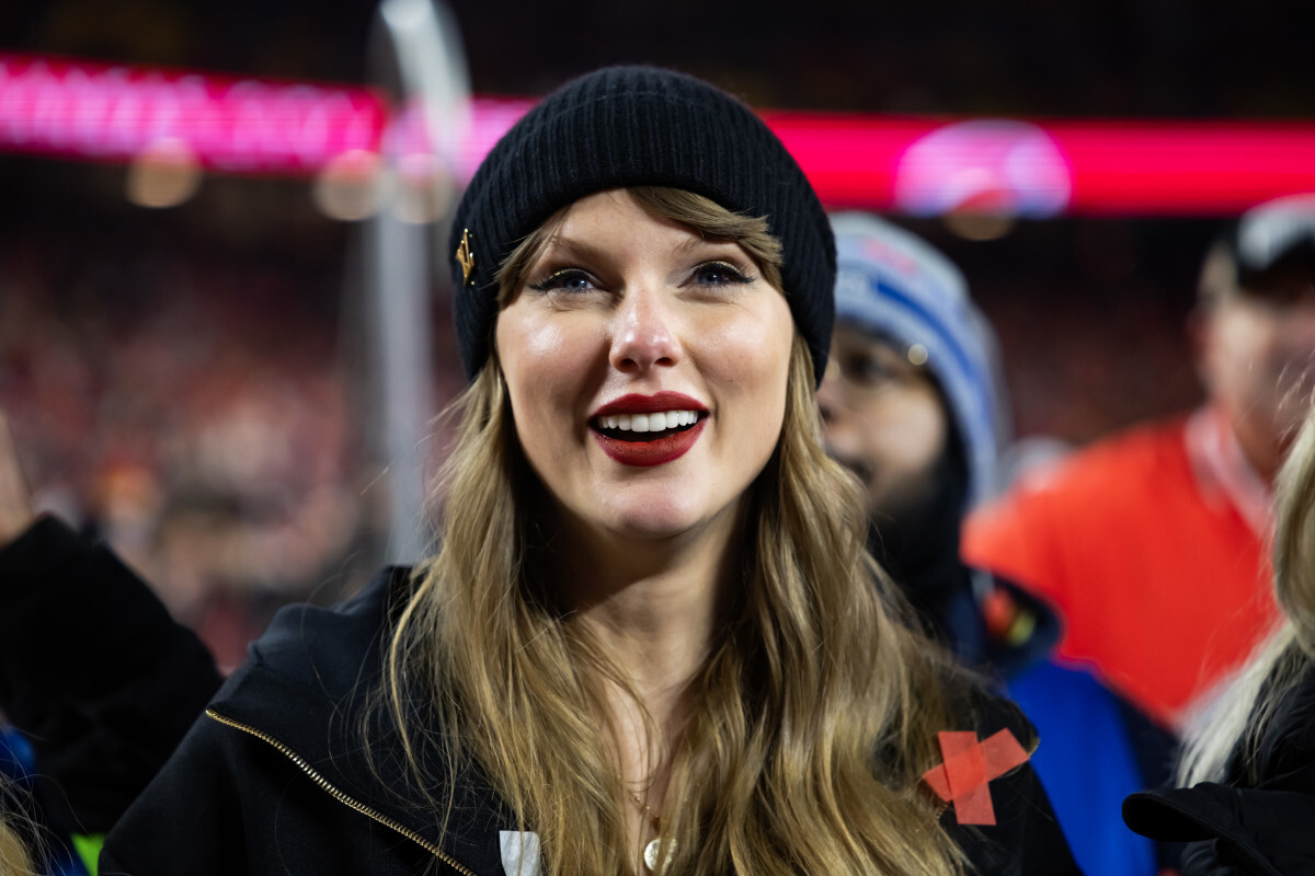  Recording artist Taylor Swift celebrates after the AFC Championship game against the Buffalo Bills at GEHA Field at Arrowhead Stadium. Mark J. Rebilas-Imagn Images