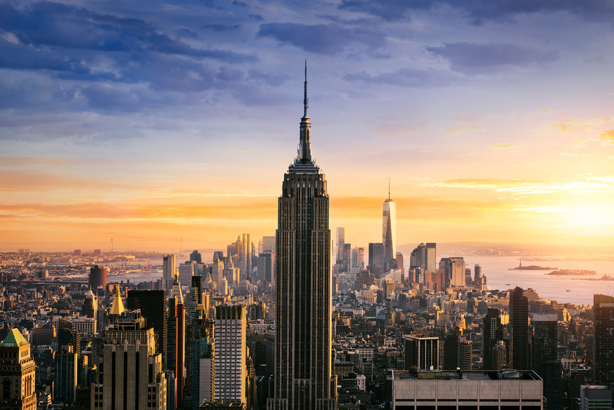  The Empire State Building is seen against the New York City skyline. 