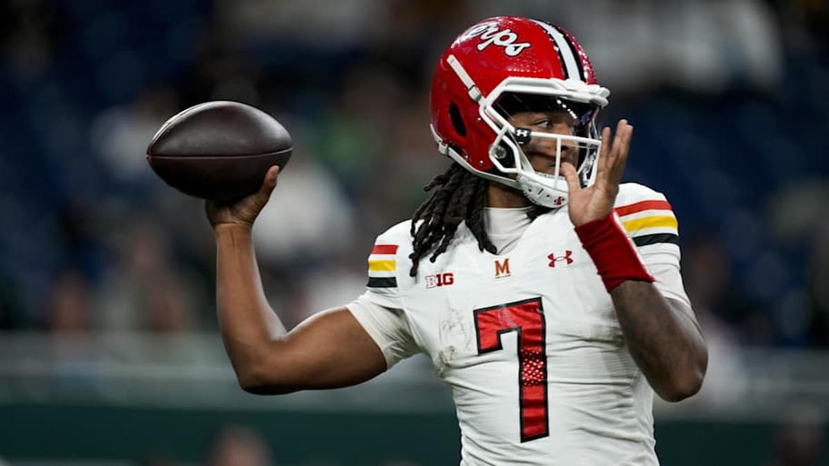  Nov 29, 2025; Detroit, Michigan, USA; Maryland quarterback Malik Washington (7) throws a pass against Michigan State in the second quarter at Ford Field. Mandatory Credit: Brendan Mullin-Imagn Images | Brendan Mullin-Imagn Images 