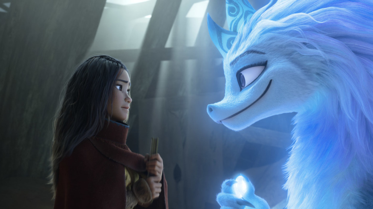 Raya (voiced by Kelly Marie Tran) and Sisu (Awkwafina) try to protect their land against a destructive force in Disney’s “Raya and the Last Dragon.”