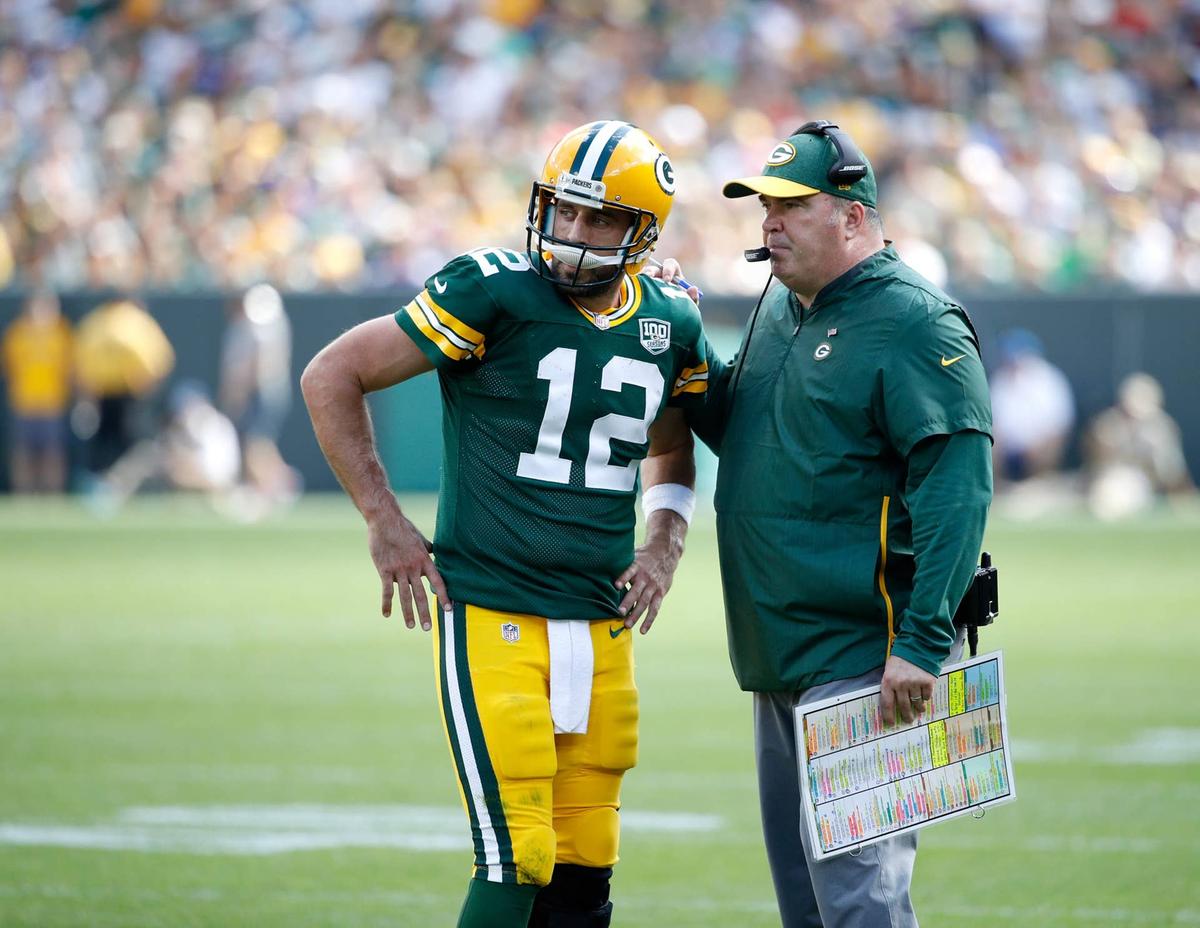  GREEN BAY, WI - SEPTEMBER 16: Aaron Rodgers #12 of the Green Bay Packers talks with head coach Mike McCarthy during the fourth quarter of a game against the Minnesota Vikings at Lambeau Field on September 16, 2018 in Green Bay, Wisconsin. (Photo by Joe Robbins/Getty Images) 