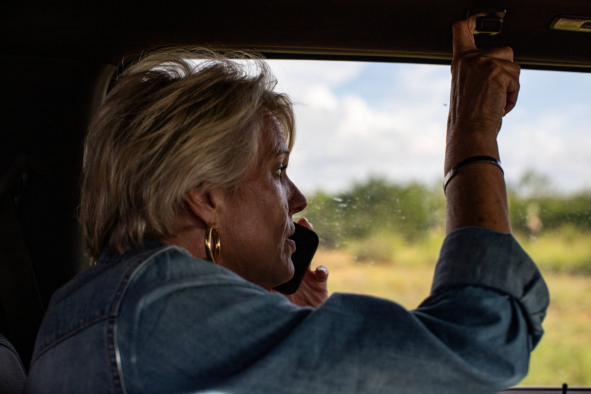 Susan Storey Rubio takes a phone call, two days after the U.S. Department of Agriculture confirmed that New World screwworm was detected in a Texas calf in Zavala County, in Cotulla, Texas, U.S. June 5, 2026.  REUTERS/Kaylee Greenlee