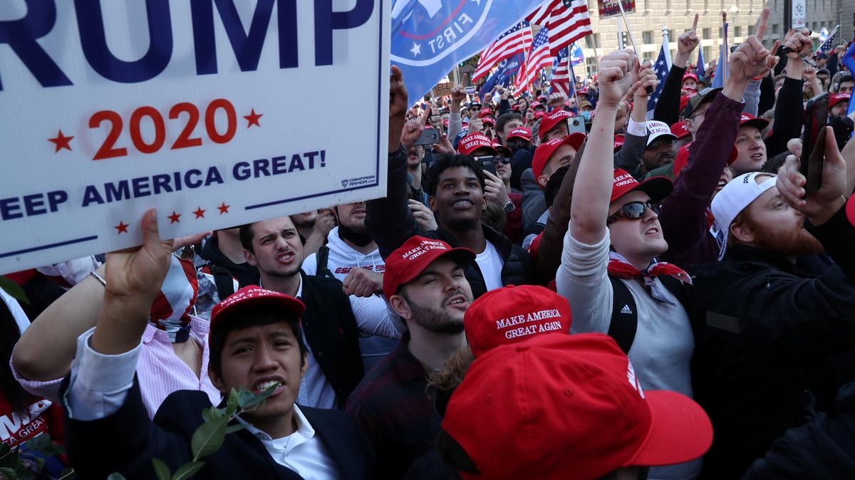 Supporters of the America First ideology and U.S. President Donald Trump listen to Nick Fuentes, a leader of the America First movement and a white nationalist, as they participate in a "Stop the Steal" and "Million MAGA March" protests after the 2020 U.S. presidential election was called for Democratic candidate Joe Biden, in Washington, U.S. November 14, 2020. REUTERS/Leah Millis/File Photo