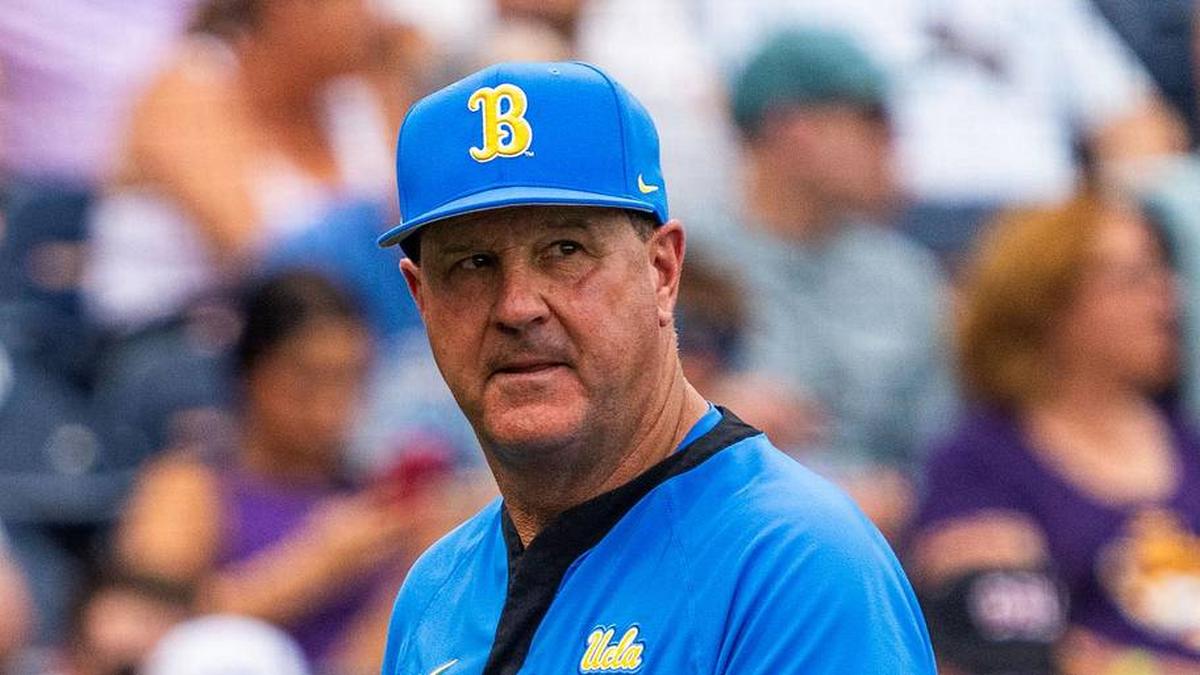  Jun 16, 2025; Omaha, Neb, USA; UCLA Bruins head coach John Savage walks off the field before the game against the LSU Tigers at Charles Schwab Field. Mandatory Credit: Dylan Widger-Imagn Images | Dylan Widger-Imagn Images 