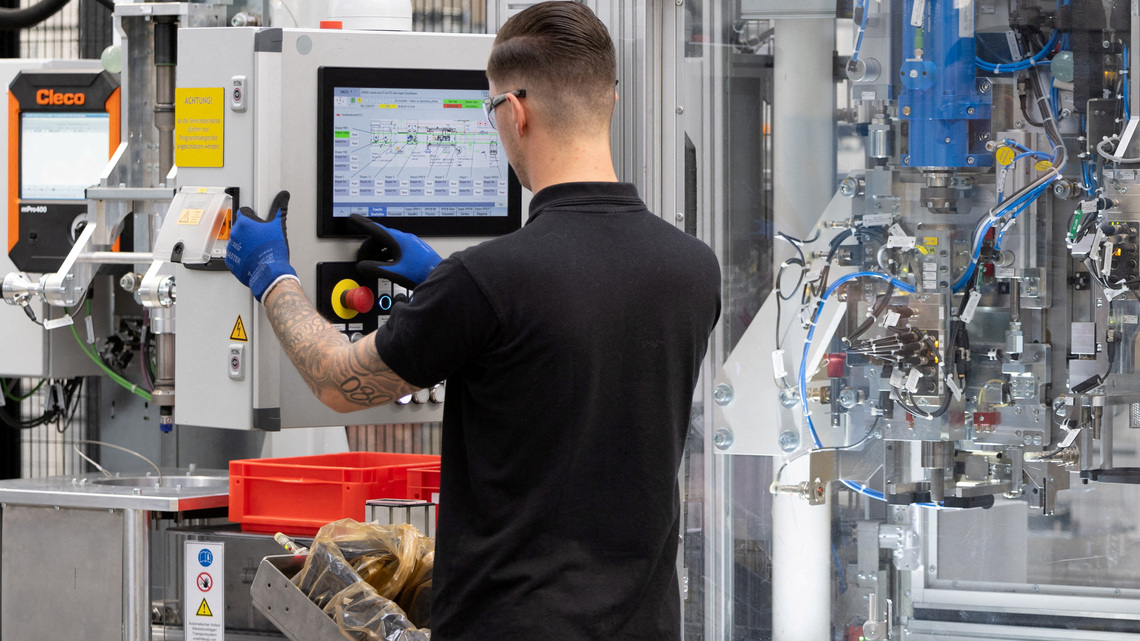 German industrial output rises more than expected in August