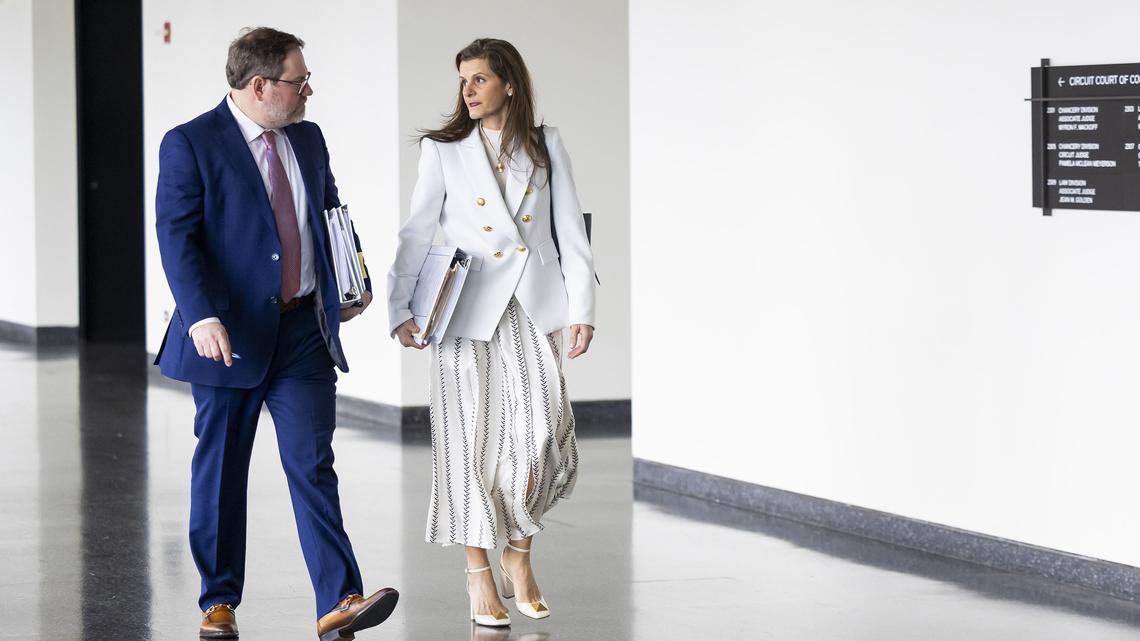 Richard Howell, left, and Hariklia Karis, attorneys representing Abbott Laboratories, walk to the courtroom at the Daley Center in Chicago on April 6, 2026, after a break in the trial against Abbott Laboratories for formula given to pre-term infants. (Eileen T. Meslar/Chicago Tribune/TNS)
