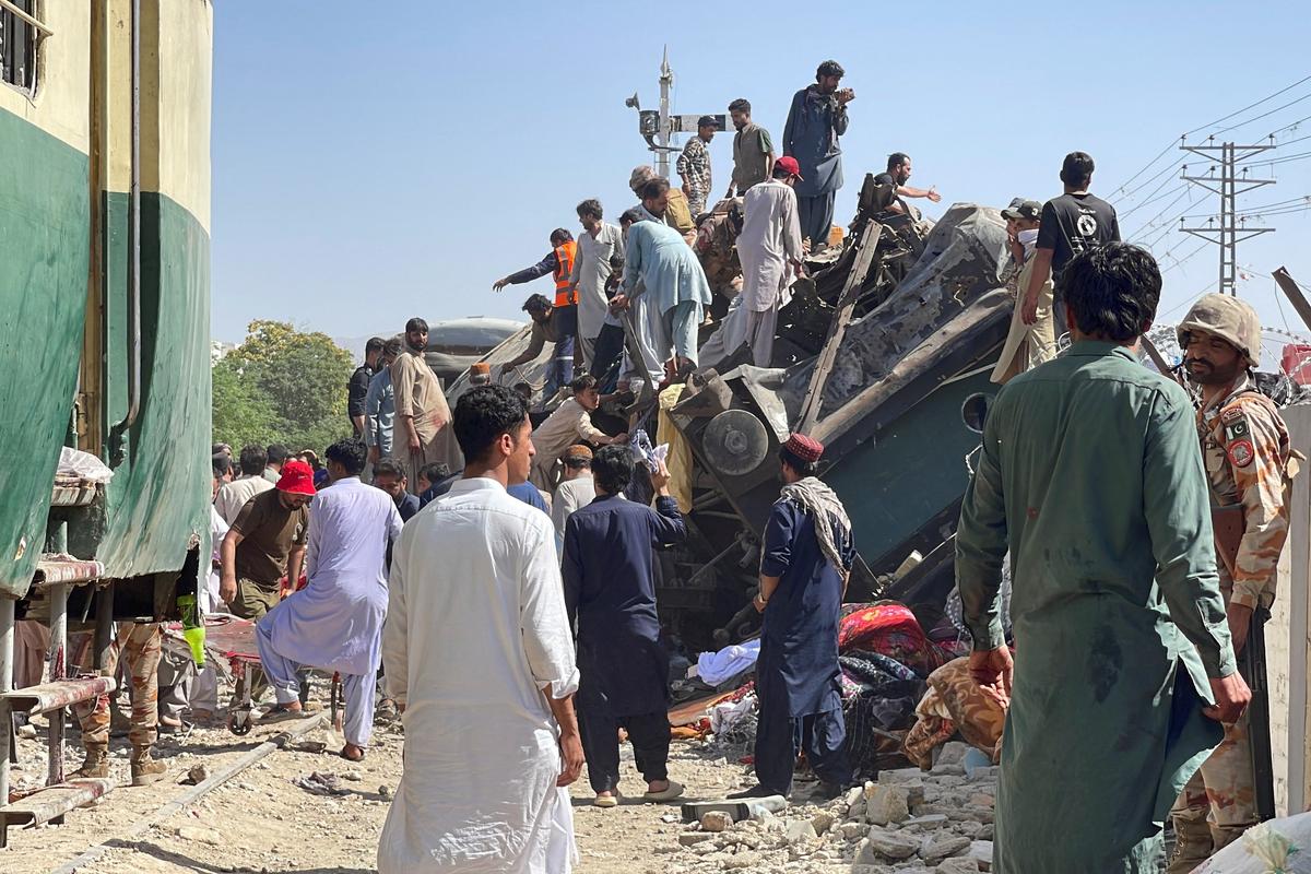 People gather as they search for survivors after a blast near a railway track in Quetta, Pakistan, May 24, 2026. Picture taken with a mobile phone. REUTERS/Stringer