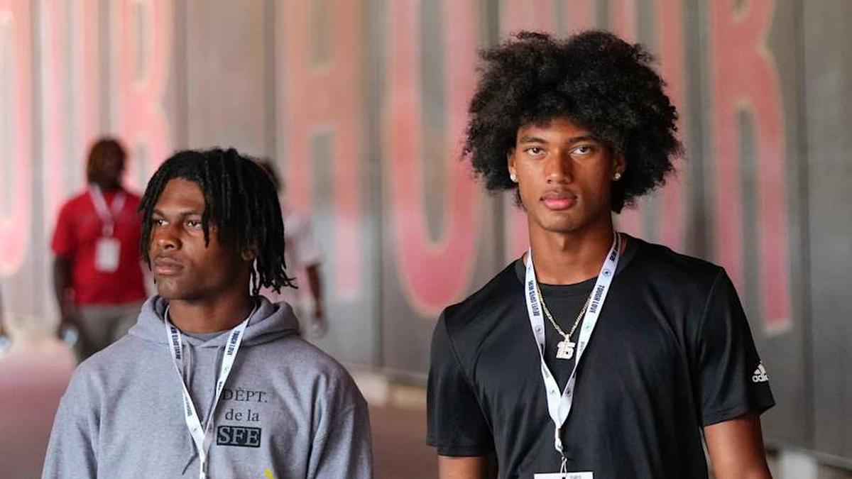  Aug 31, 2024; Columbus, OH, USA; Ohio State Buckeyes recruits Kayden Dixon-Wyatt and Chris Henry Jr. walk onto the field prior to the NCAA football game against the Akron Zips at Ohio Stadium. Ohio State won 52-6. | Adam Cairns/Columbus Dispatch / USA TODAY NETWORK via Imagn Images 