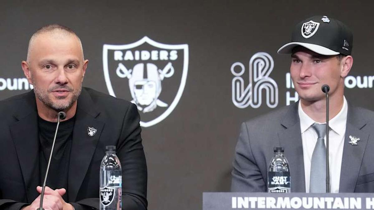  Apr 24, 2026; Henderson, NV, USA; Las Vegas Raiders quarterback Fernando Mendoza (right) and general manager John Spytek at introductory press conference at Intermountain Health Performance Center after being selected as the No. 1 pick in the 2026 NFL Draft. Mandatory Credit: Kirby Lee-Imagn Images | Kirby Lee-Imagn Images 